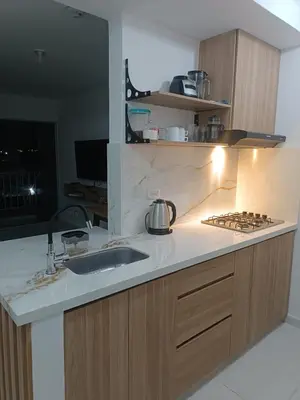 a kitchen with a sink and a counter top at Apartamento para familias cerca de la playa y sitios turísticos in Cartagena de Indias