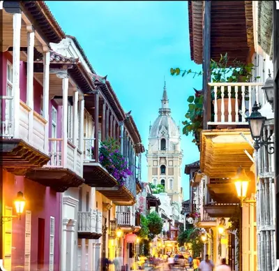 a city street with a cathedral in the background at Vive Cartagena frente al mar y el lago in Cartagena de Indias