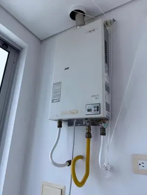 a room with a microwave oven hanging from a ceiling at 3br Apartment in front of the beach 8 paxs in Cartagena de Indias