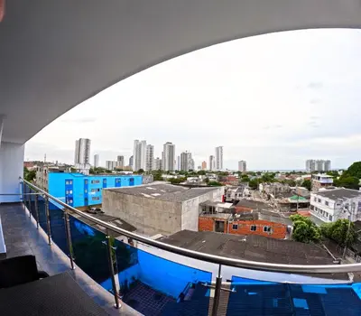 a view of the city from the balcony of a building at Apartamento Mirador cerca al Centro Historico in Cartagena de Indias
