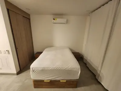 a small hospital room with a bed in it at Apartamento vacacional con acceso al mar in Santa Marta