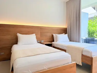 a bedroom with two beds and a window at 2-Bedroom Apartment with Private Pool - Morros Kai in Cartagena de Indias