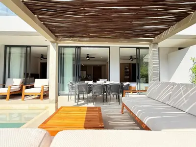 a living room with a couch and a table at 2-Bedroom Apartment with Private Pool - Morros Kai in Cartagena de Indias