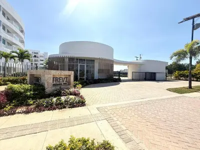 a building with a sign in front of it at Serena del Mar in Cartagena de Indias