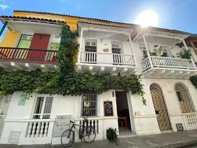 a bike parked in front of a building at Cozy apartment Old City in Cartagena de Indias