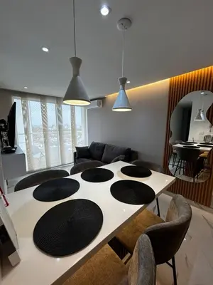 a living room with a table and chairs at Apt 2704 in Cartagena de Indias