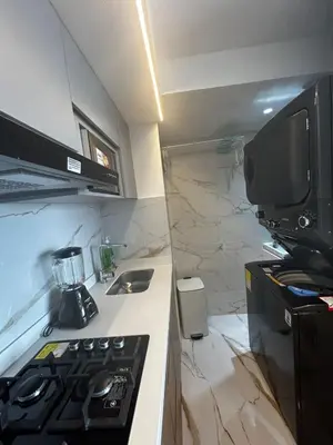 a kitchen with a stove and a counter top at Apt 2704 in Cartagena de Indias