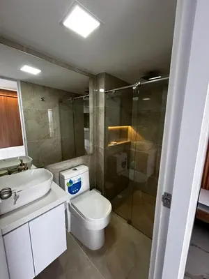 a bathroom with a toilet and a sink and a shower at Apt 2704 in Cartagena de Indias