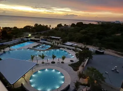 an overhead view of two swimming pools at a resort at Nuevo Loft santa Marta vista al mar piso 18 in Santa Marta