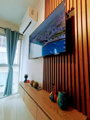 a living room with a flat screen tv on a wall at Apartamento en Cartagena cerca al Mar in Cartagena de Indias