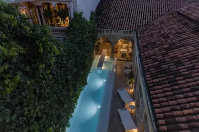 an overhead view of a swimming pool in a building at NOK Award Winning 4BR Villa wih pool at Getsemani in Cartagena de Indias