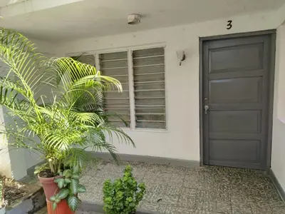 a door of a house with plants in front of it at Entire house in Cartagena in Cartagena de Indias