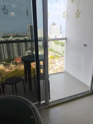 a view from a room with a table and a window at Cartagena near the beach in Cartagena de Indias