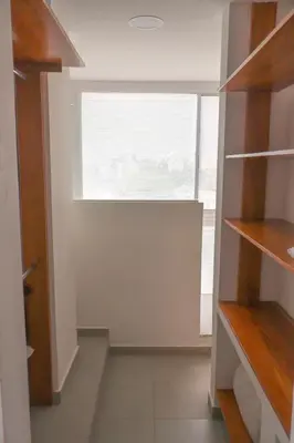 an empty room with a window in a room at Tu Espacio Perfecto en el Norte de Barranquilla - Moderno y Amplio - Apto Dúplex in Barranquilla