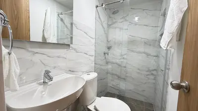 a bathroom with a sink and a toilet and a shower at apartamento en Canapote cerca a la playa de Marbella in Cartagena de Indias