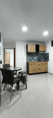 a living room with a table and a dining room at Brisa y Rio Apartamento en Norte Centro historico in Barranquilla
