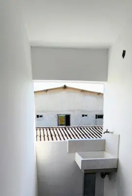a bathroom with a sink and a view of a building at Brisa y Rio Apartamento en Norte Centro historico in Barranquilla