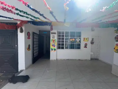 a room with a door and a cat laying on the floor at The best room in Barranquilla! in Barranquilla