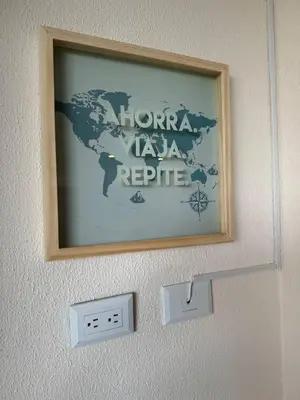 a picture of a map of the world on a wall at Cartagena Cielo Mar Apartment Steps from the Beach in Cartagena de Indias