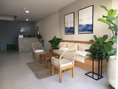 a living room with a couch and chairs at loft relax con vista al mar in Cartagena de Indias