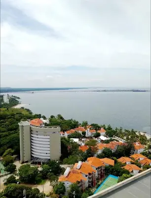 an aerial view of a city and the water at New apartment on the 18th floor in Santa Marta with ocean views in Simón Bolivar