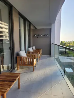 a row of benches on the balcony of a building at Apartamento in Morros Eos-Manzanillo del Mar in Cartagena de Indias