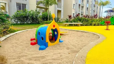 a playground in a sandbox with a toy in the sand at Apartamento moderno cerca del mar - Cartagena in Cartagena de Indias