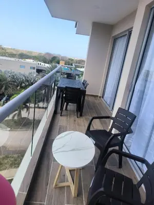 a balcony with a table and chairs on a balcony at Baía Kristal Spectacular View Crystal Clear Lagoon in Cartagena de Indias