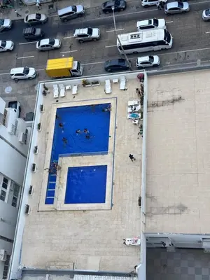 an overhead view of a swimming pool on the side of a building at Delfines De Bocagrande in Cartagena de Indias