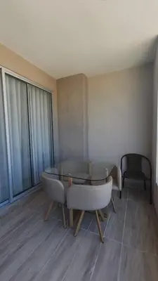 a dining room with a glass table and chairs at Santa Marina Caribbean Dreams in Santa Marta