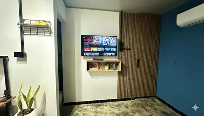 a room with a flat screen tv on a wall at Cabaña la Industrial in Coveñas