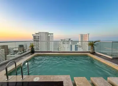 a swimming pool on the roof of a building at Cartagena Relax in Cartagena de Indias