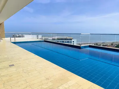 a swimming pool on the roof of a building at 2H Encanto rentals at Sunno Beach in Cartagena de Indias