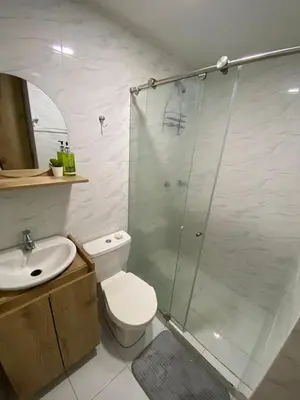 a bathroom with a shower and a toilet and a sink at Premium stay in a central area with parking in Cartagena de Indias