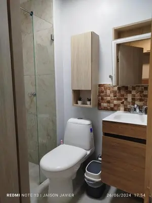 a bathroom with a toilet and a shower and a sink at walled city of Cartagena 20 in Cartagena de Indias