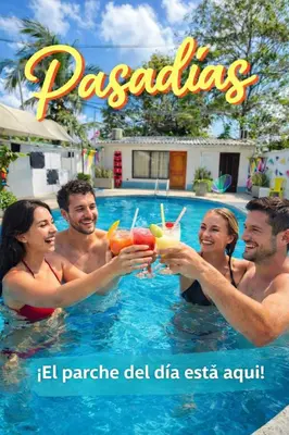 a group of people in a swimming pool with drinks at Wonderland Cartagena in Cartagena de Indias