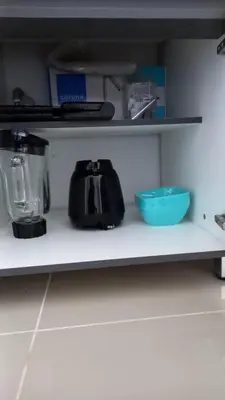 a shelf with a blender and a bowl on it at Apartamento en Torices in Cartagena de Indias