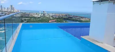 a view from the balcony of a house with a swimming pool at Apartamento en Torices Piso 24 - Cartagena - Playa cerca al Mar in Cartagena de Indias
