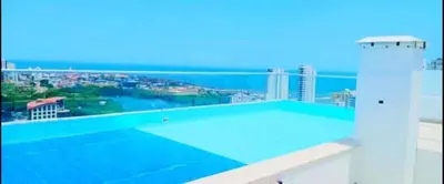 a view of a city from the top of a building at Apartamento en Torices Piso 24 - Cartagena - Playa cerca al Mar in Cartagena de Indias