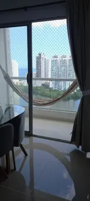 a room with a window with a view of a city at Apartamento en Torices Piso 24 - Cartagena - Playa cerca al Mar in Cartagena de Indias