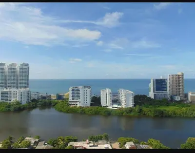a view of a city with a river and buildings at New Apartment Frente al Mar, Cerca Getsemani in Cartagena de Indias