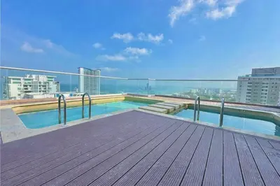 a swimming pool on the roof of a building at Apartamento cerca al Mar y a el Centro Histórico in Cartagena de Indias