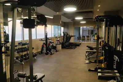 a gym with lots of treadmills and exercise bikes at Loft Privado , Sunset y armonia in Santa Marta
