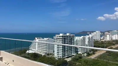 a view of a city with buildings and the ocean at Loft Privado , Sunset y armonia in Santa Marta