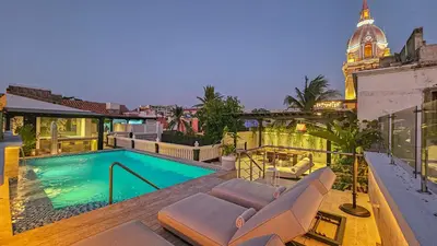 a swimming pool on the roof of a building at Casa De La Imprenta in Cartagena de Indias