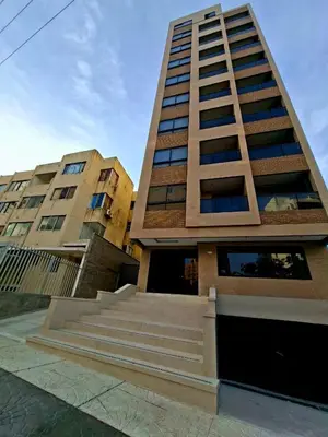 a tall building with stairs in front of it at Edificio Shanty- Easy Rents Sas in Barranquilla
