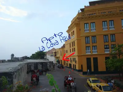 a view of a building with cars and a car hall at Apto exclusivo Centro Historico in Cartagena de Indias