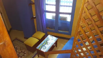 an overhead view of a room with a chair and a window at Apto exclusivo Centro Historico in Cartagena de Indias