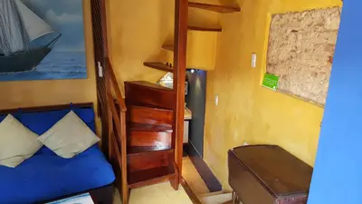a small room with a bunk bed and a ladder at Apto exclusivo Centro Historico in Cartagena de Indias