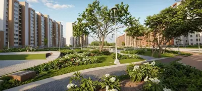 a park with flowers and trees and buildings at Apartamentos Mirador - Excelente Ubicación by SOHO in Barranquilla